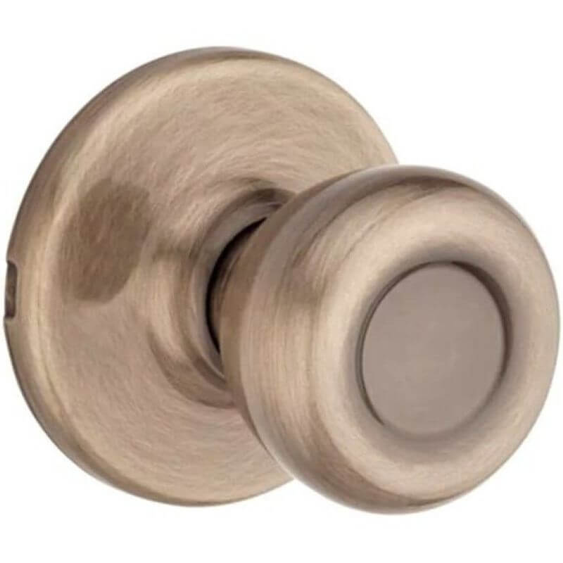 Kwikset Tylo Antique Brass Steel Right or Left Hand Passage Door Knob